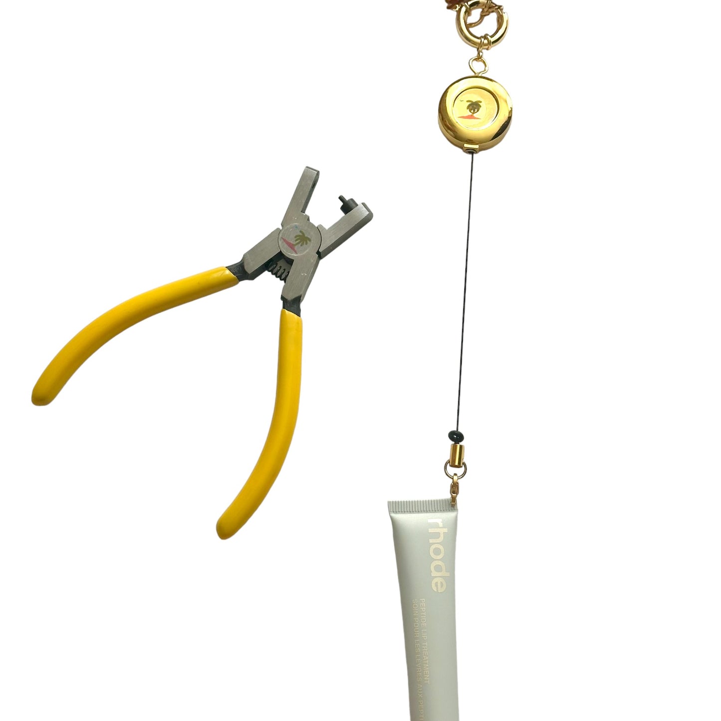 The 'Gimme' Gold Retractable Tube Holder